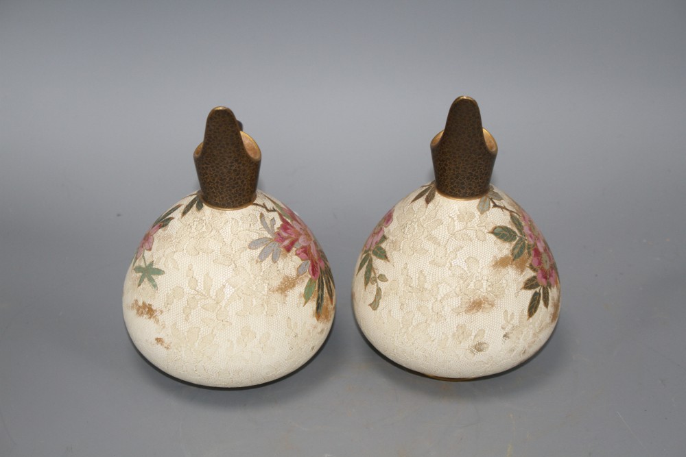 A pair of Doulton Burslem ewers, with floral decoration, US Patent stamp to base, height 17.5cm